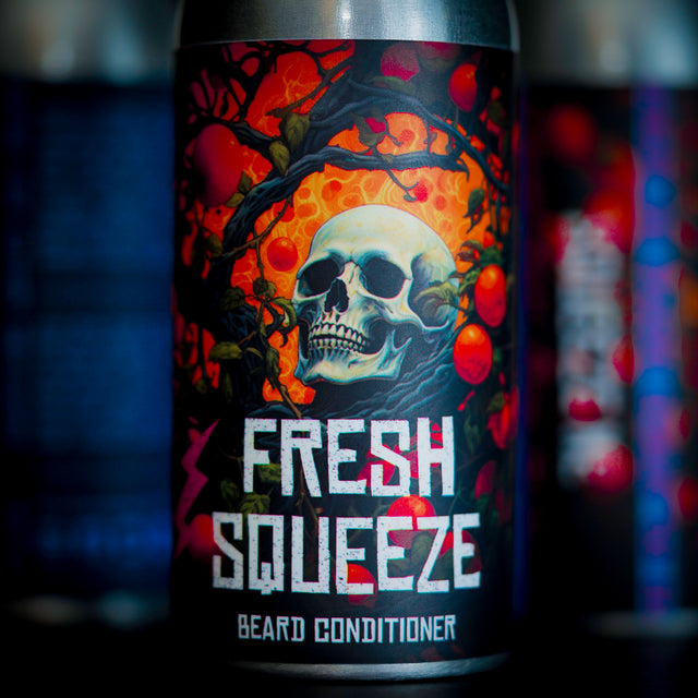 A bottle of Fresh Squeeze beard conditioner by The Bearded Grenade.