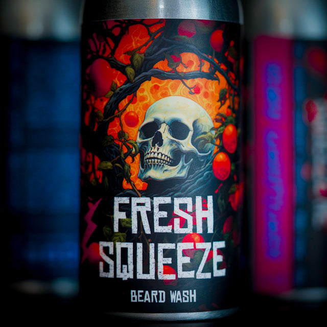 A bottle of Fresh Squeeze beard wash by The Bearded Grenade